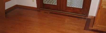 Prefinished hardwood flooring with a dark border